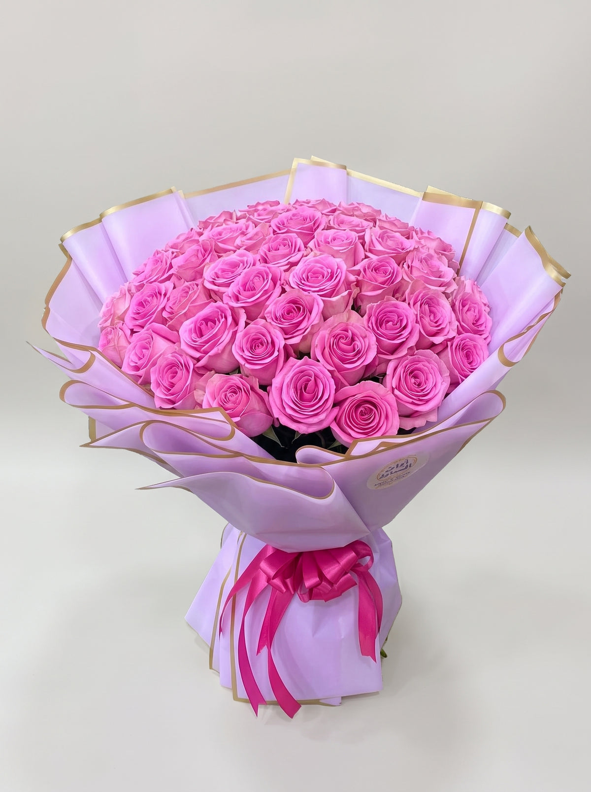 Hot Pink Roses Bouquet in Lilac Wrap