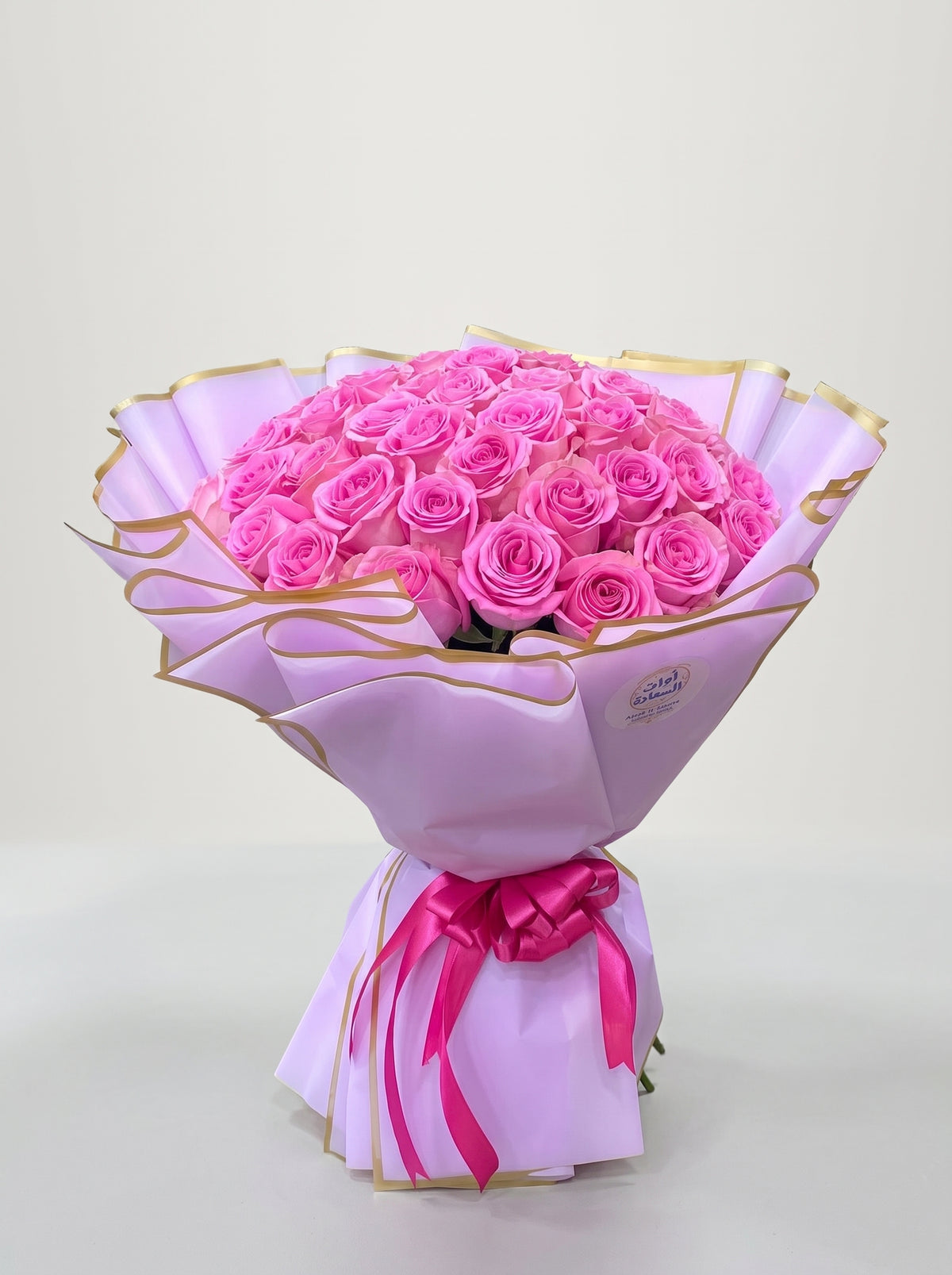 Hot Pink Roses Bouquet in Lilac Wrap