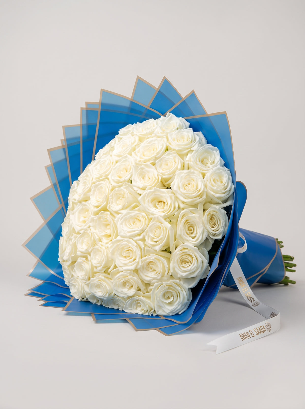 White Roses Bouquet in Royal Blue Wrap