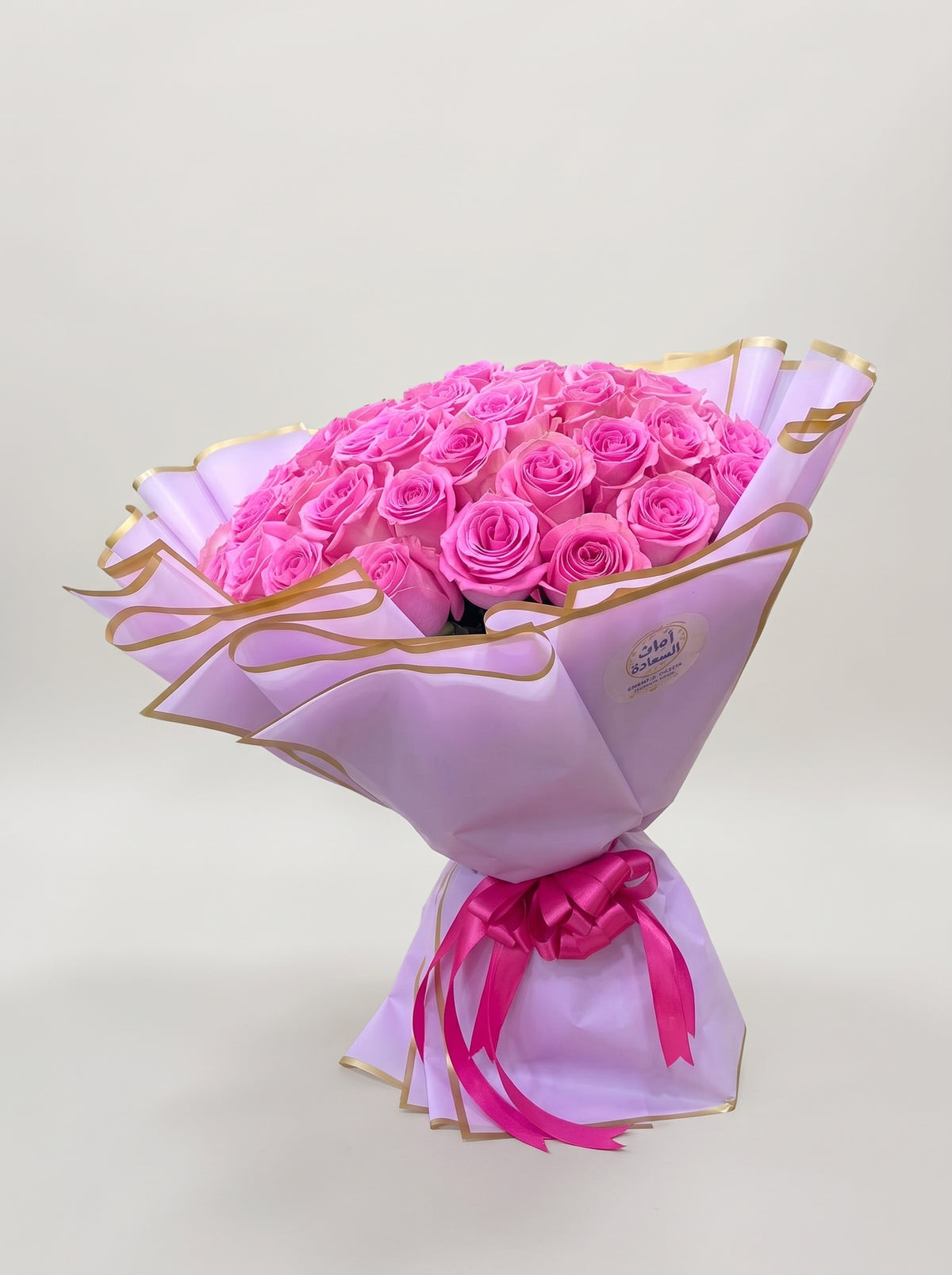 Hot Pink Roses Bouquet in Lilac Wrap