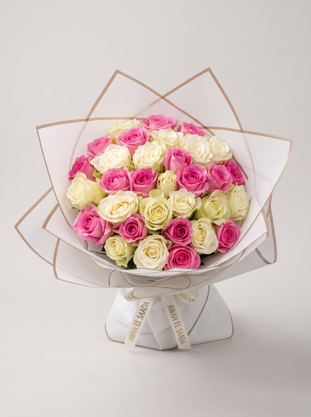 Pink & White Roses Bouquet in White Wrap