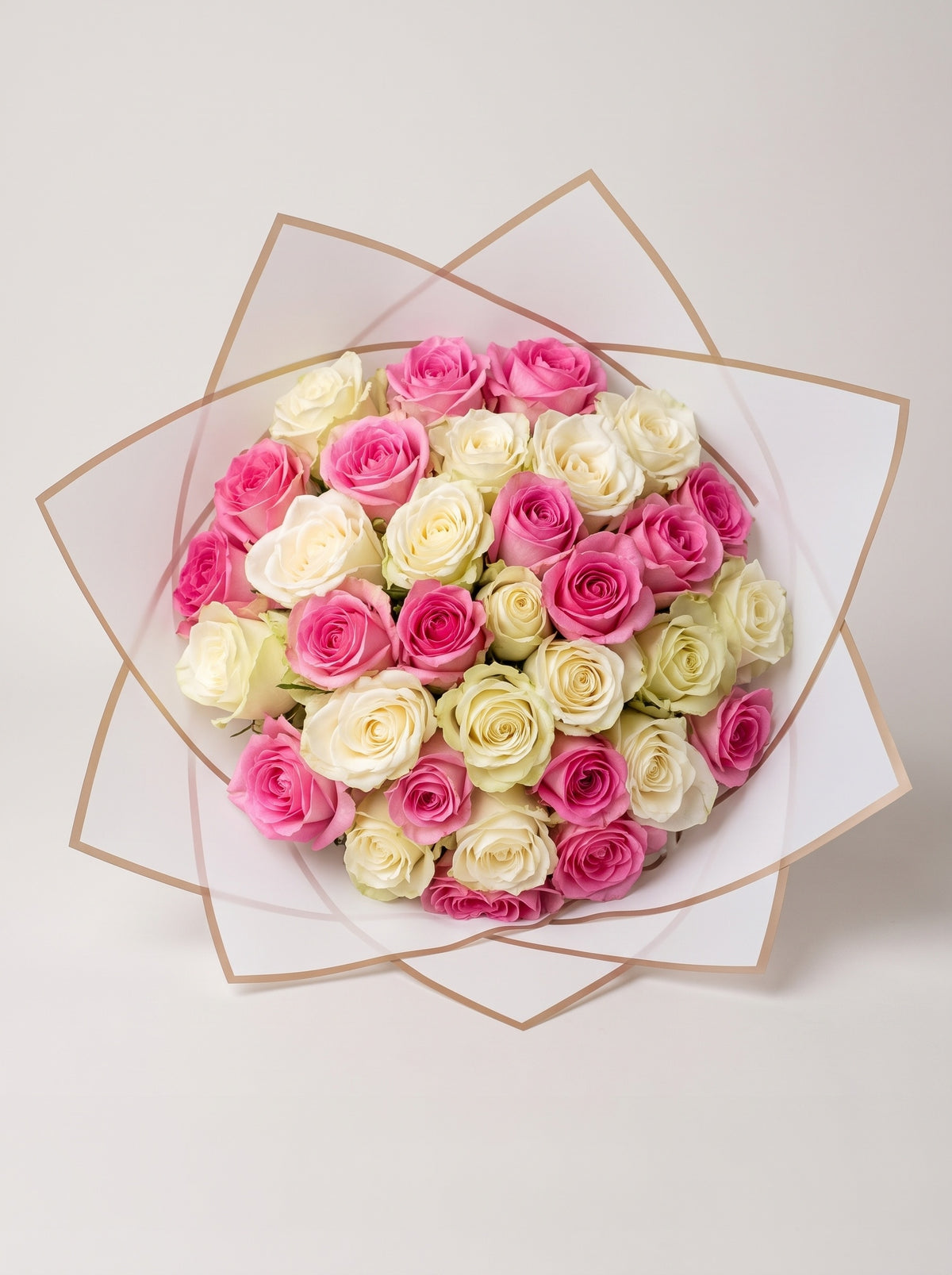 Pink & White Roses Bouquet in White Wrap