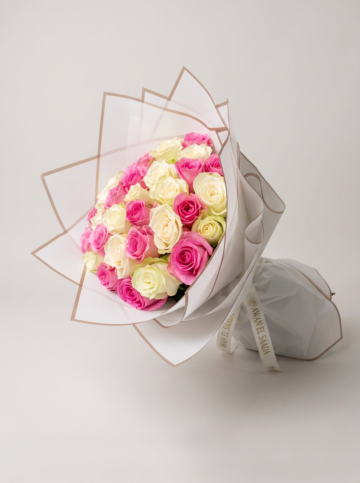 Pink & White Roses Bouquet in White Wrap